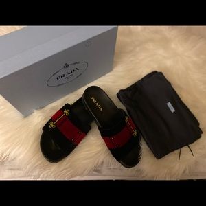 Women’s Prada slides.